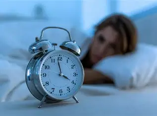 Réveils nocturnes : causes et solutions pour mieux dormir - Qi Céleste